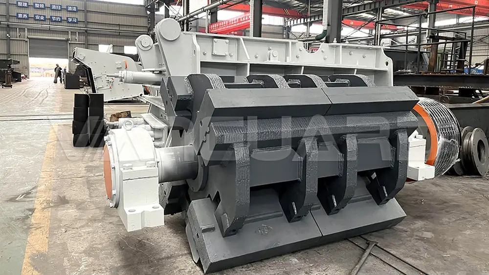 Impact crusher rotor, blow bars and impact plates